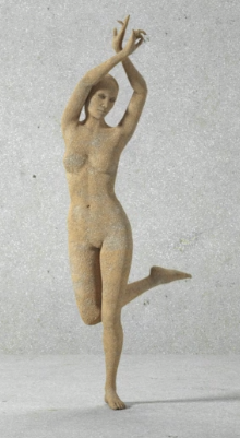 stone variation: a humanoid figure of a nude, monotone tan female who 
	appears to be made of stone; she stands on one leg with arms raised and crossed above her head, with one leg bent at the knee and parallel 
	to the ground
